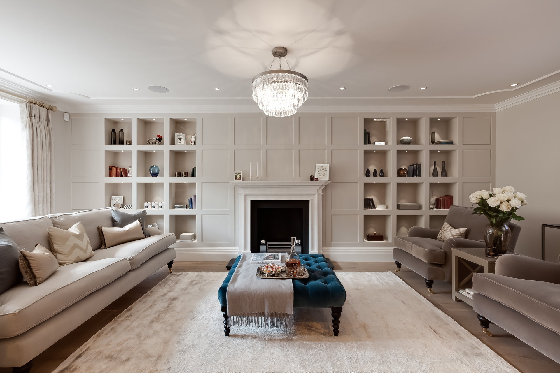 contemporary sitting room with bespoke fireplace and joinery design